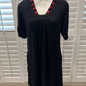 Elegant Black Dress with Red Button Accents